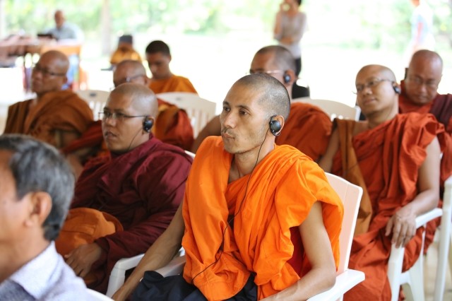 Monks from different nations listen to Pomnyun Sunim