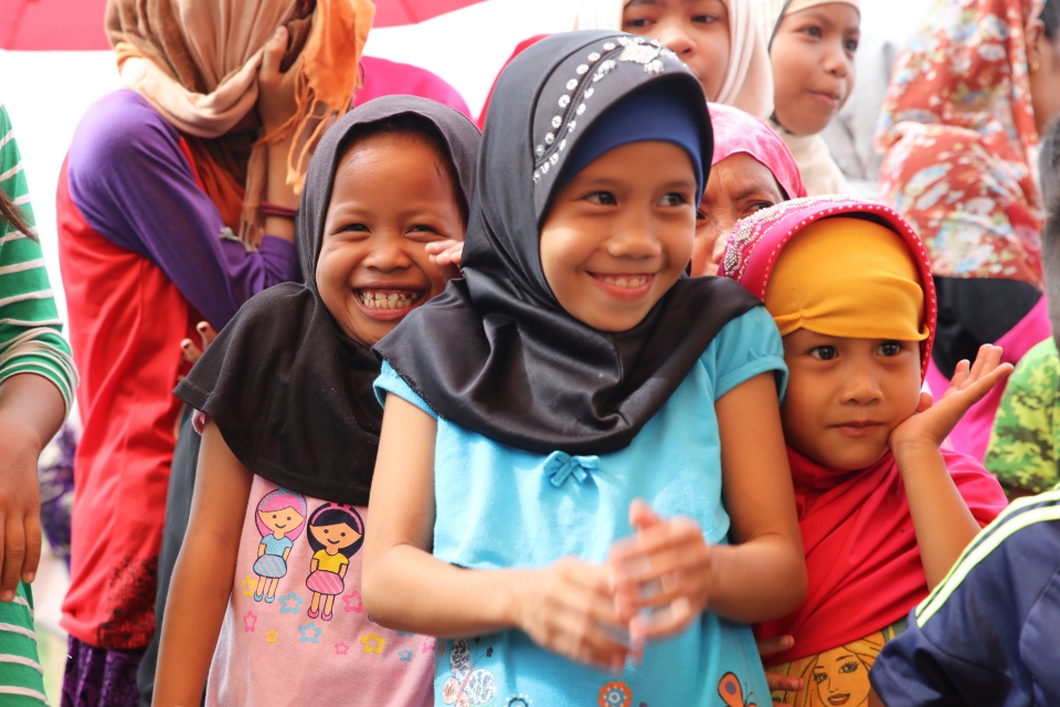 Children smile at the news of new school