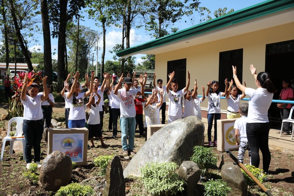 Students performs in a sign language