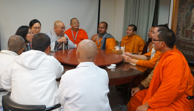 Sunim and INEB monks having a discussion