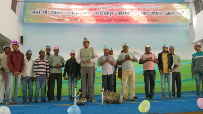 Villagers perform traditional song