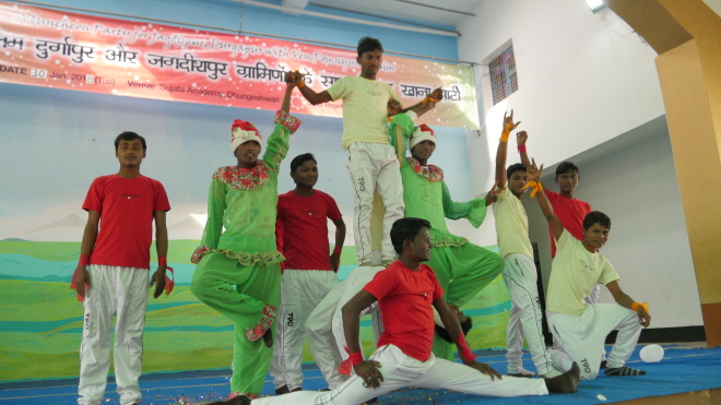 Village youth performs acrobatics